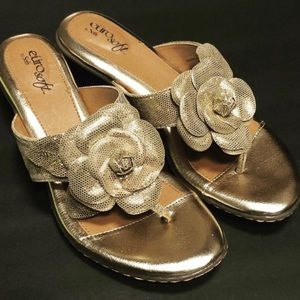 - Leather Gold Thong Sandals With Floral Design
